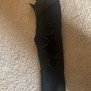 Black AE skinny ripped jeans
